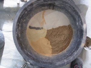 Grundstoffe in Pulverform für die Sandsteinersatzmasse